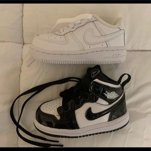 2 pairs size 5 baby Nike sneakers